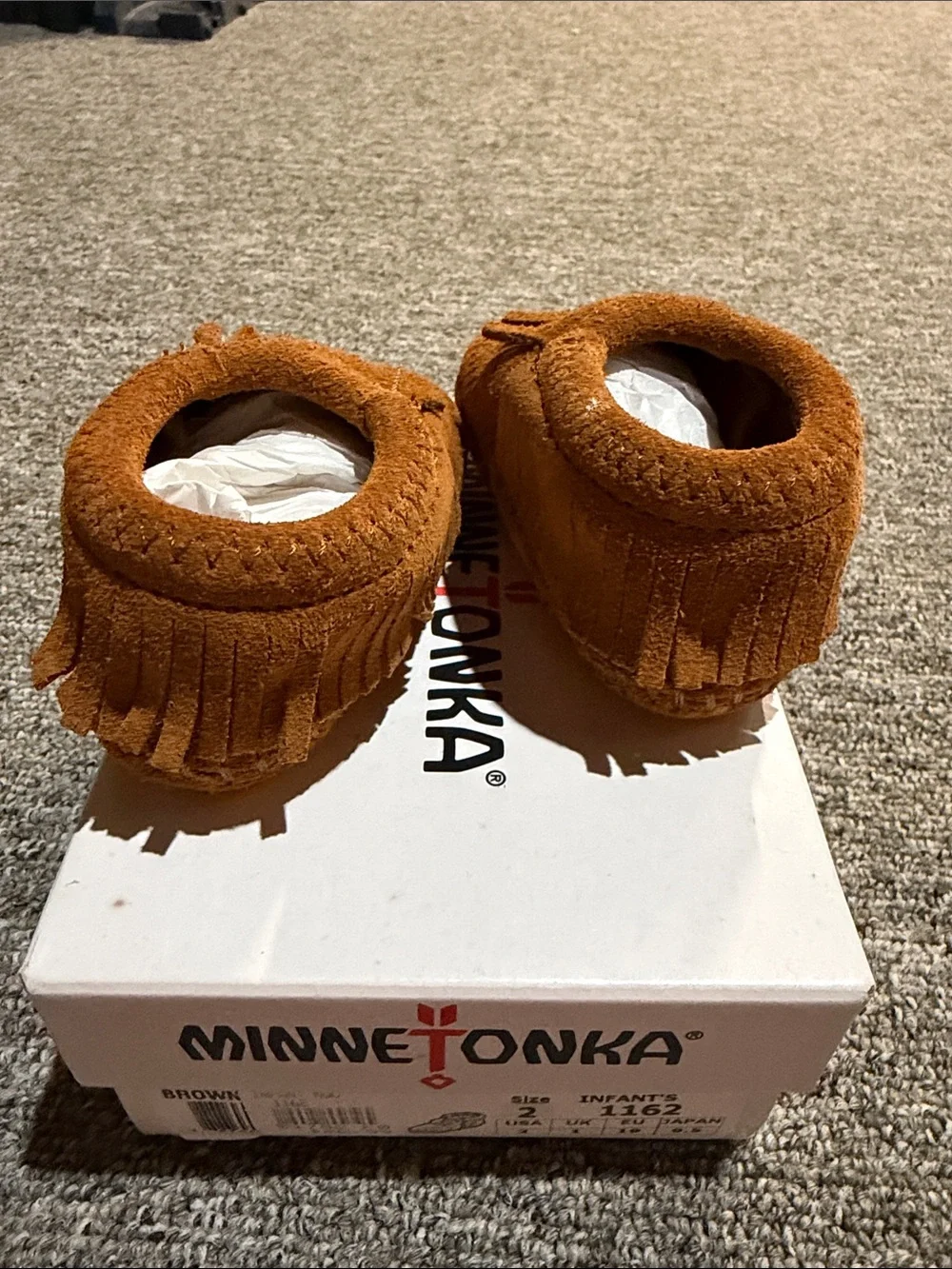 Minnetonka Kids Suede Fringe Moccasins in Brown